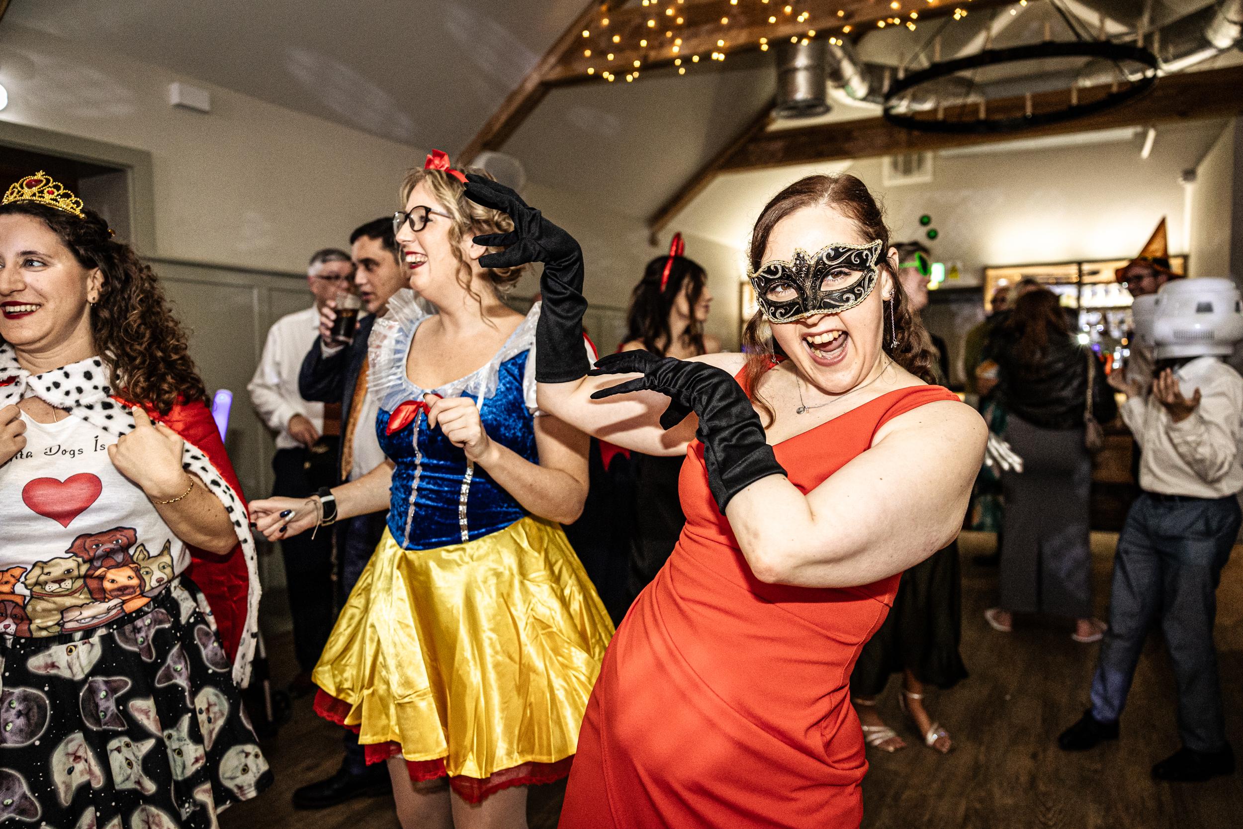 Non-Traditional Wedding Photography of guests dancing